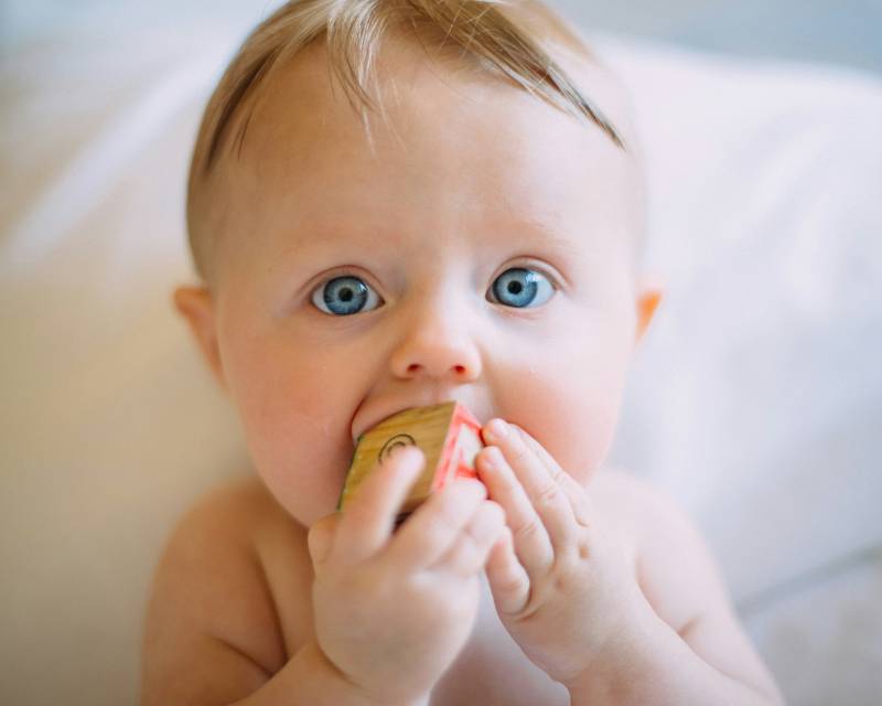 Baby playing with blocks